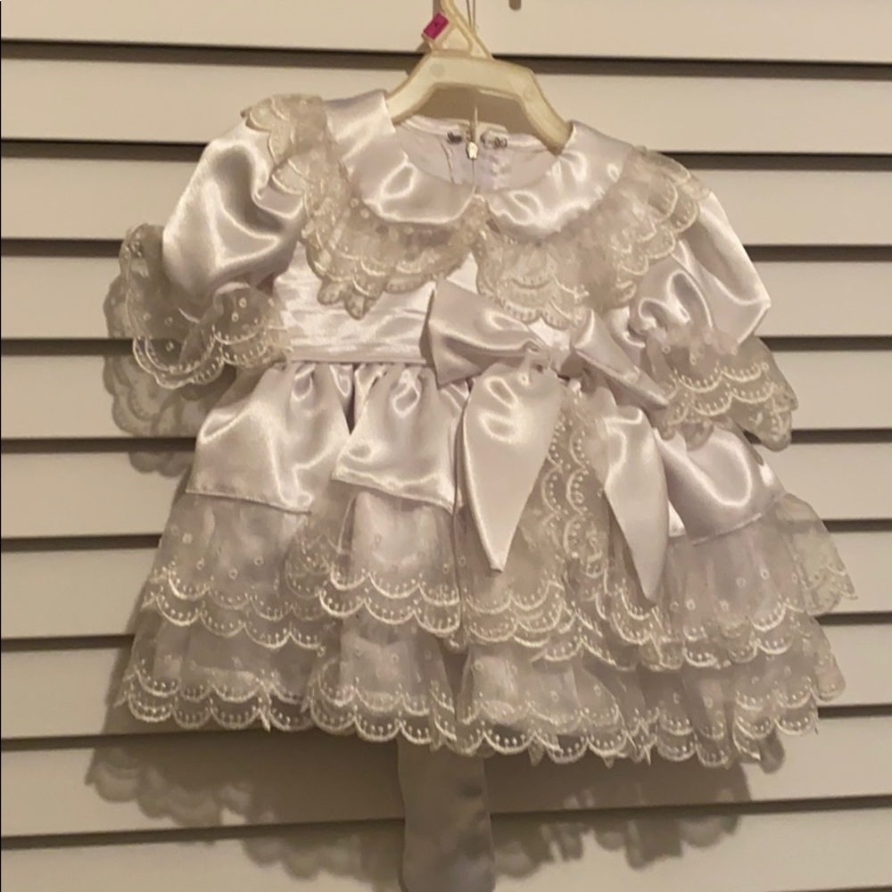 Hand made and custom stitched baby dress